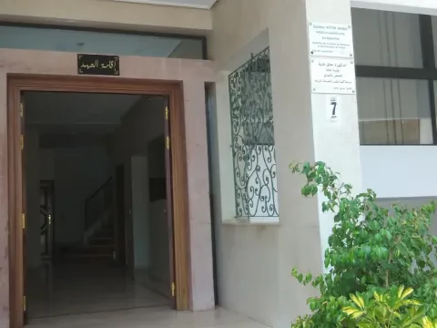 Dr Nadia Attak