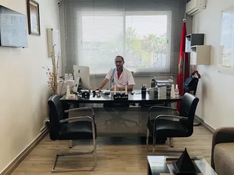 Dr Karim Ouali